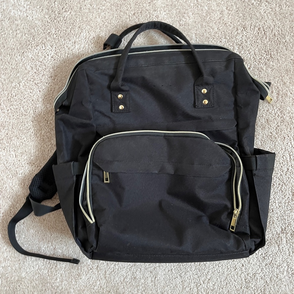 Waterproof commuter bag with laptop sleeve